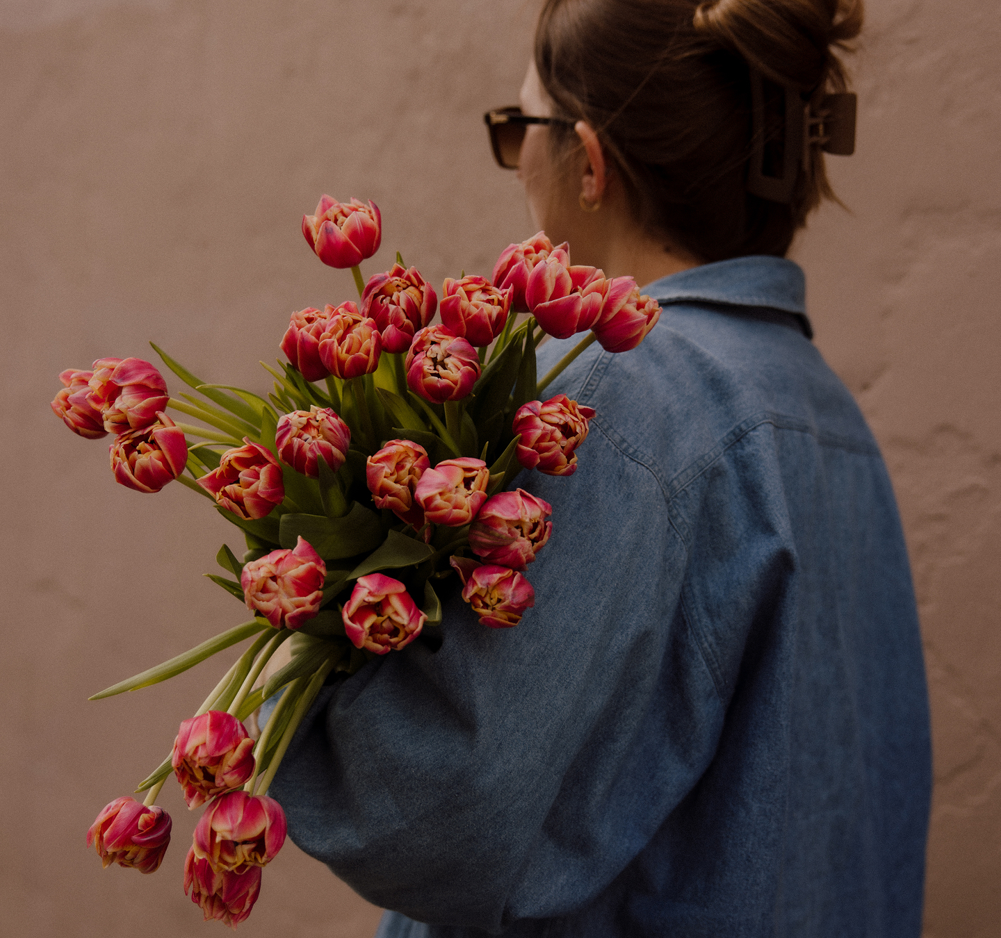 A woman with tulips in her hand