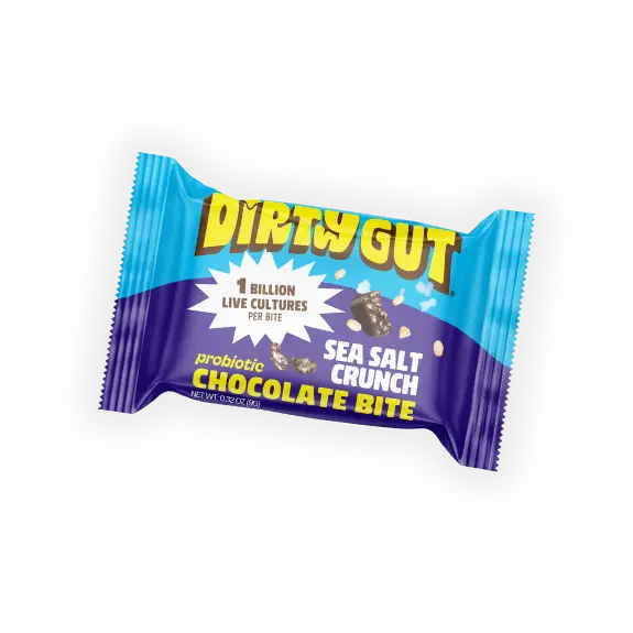 A Dirty Gut Probiotic Sea Salt Crunch Chocolate Bite in its blue and purple wrapper.
