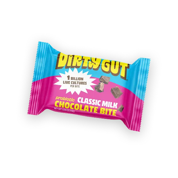 A Dirty Gut Probiotic Classic Milk Chocolate Bite in its blue and pink wrapper.