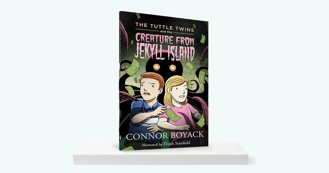 The book 'The Tuttle Twins and the Creature from Jekyll Island' standing on a white shelf.