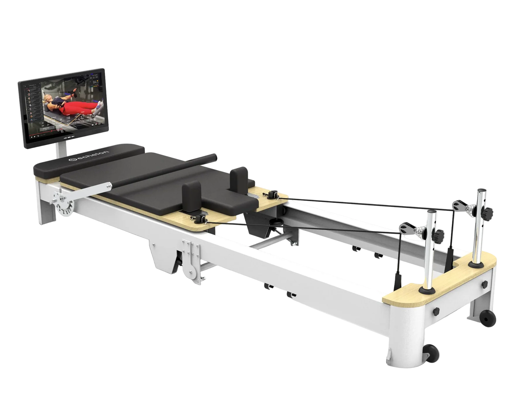 An Echelon Pilates reformer machine with an attached monitor displaying a workout class, on a white background.