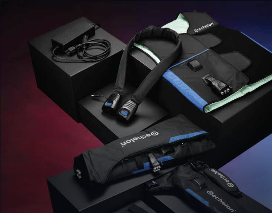 A collection of Echelon fitness recovery products, including wraps, a charger, and cases, on display stands.