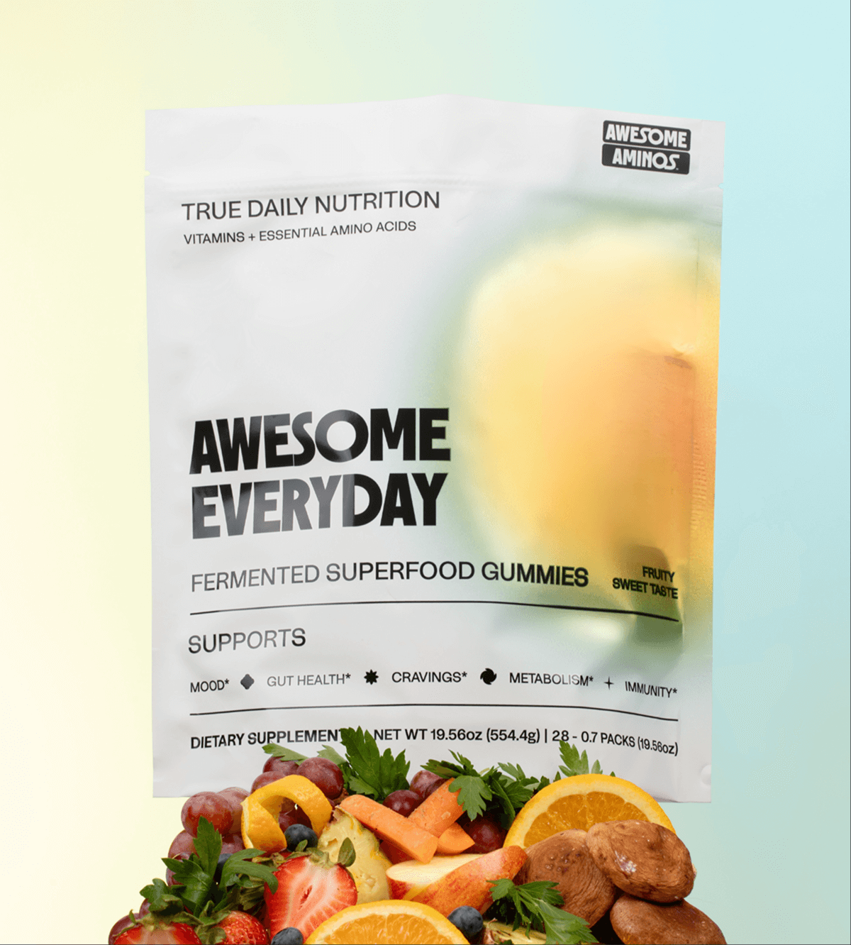 Package of 'Awesome Everyday' superfood gummies with fruits in the foreground.