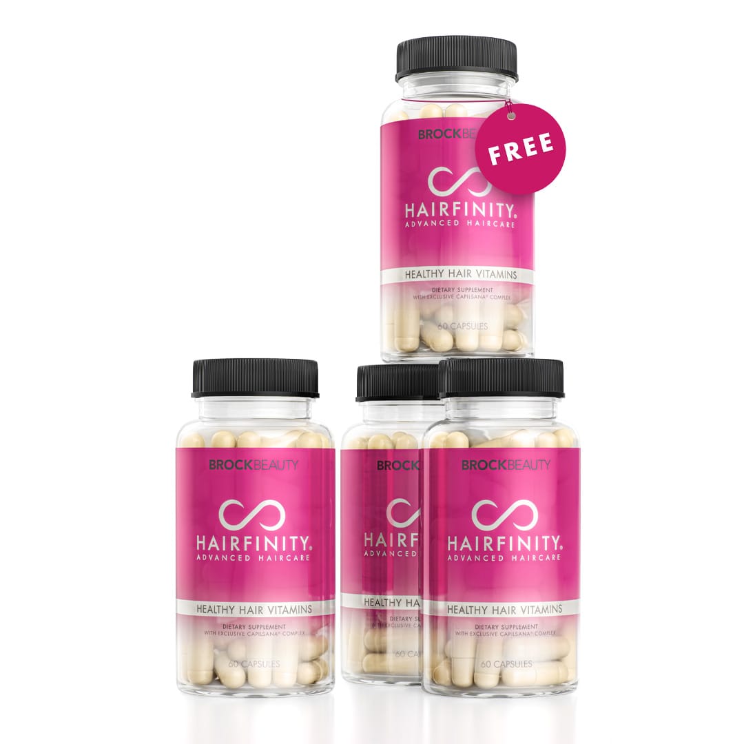 Five bottles of Hairfinity hair vitamins stacked with a 'Free' tag.