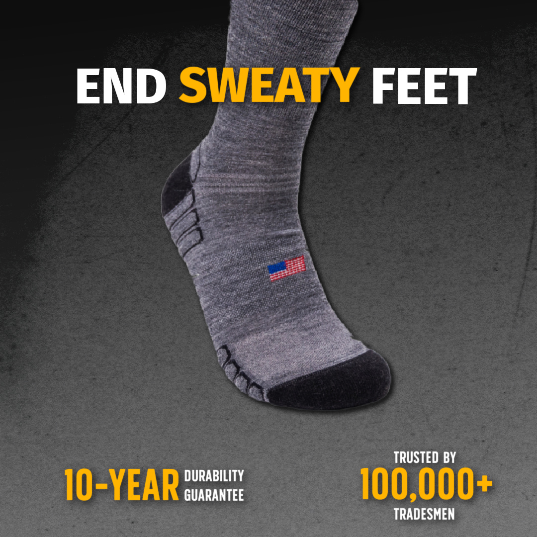 Grey sock with a small US flag, bold text emphasizing durability.
