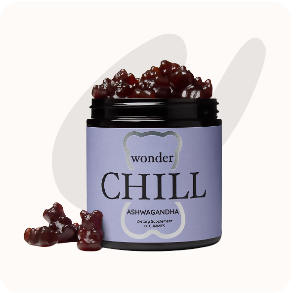 Jar of ashwagandha gummies labeled 'wonder CHILL' with gummies spilling out.