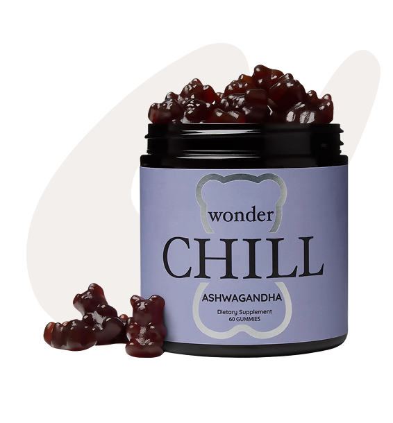 Jar of ashwagandha gummies labeled 'Wonder Chill' with gummies spilling out.