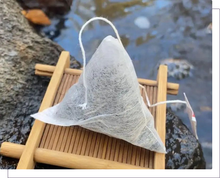 Image of a Teaba on a bambu board next to a river