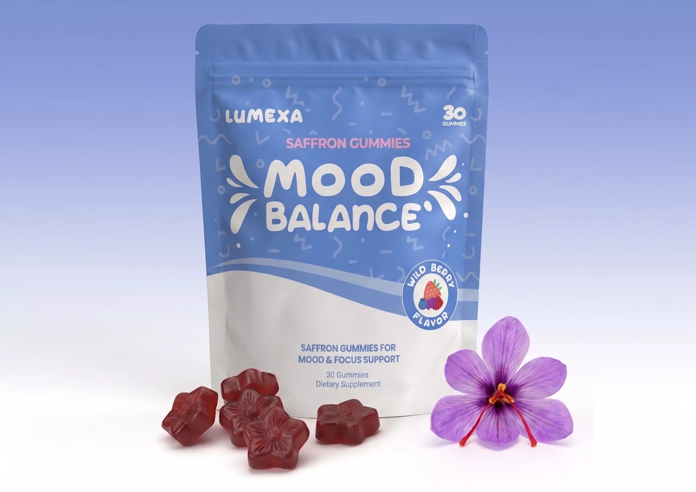 A blue pouch of Lumexa Mood Balance saffron gummies next to several red gummies and a purple saffron flower.