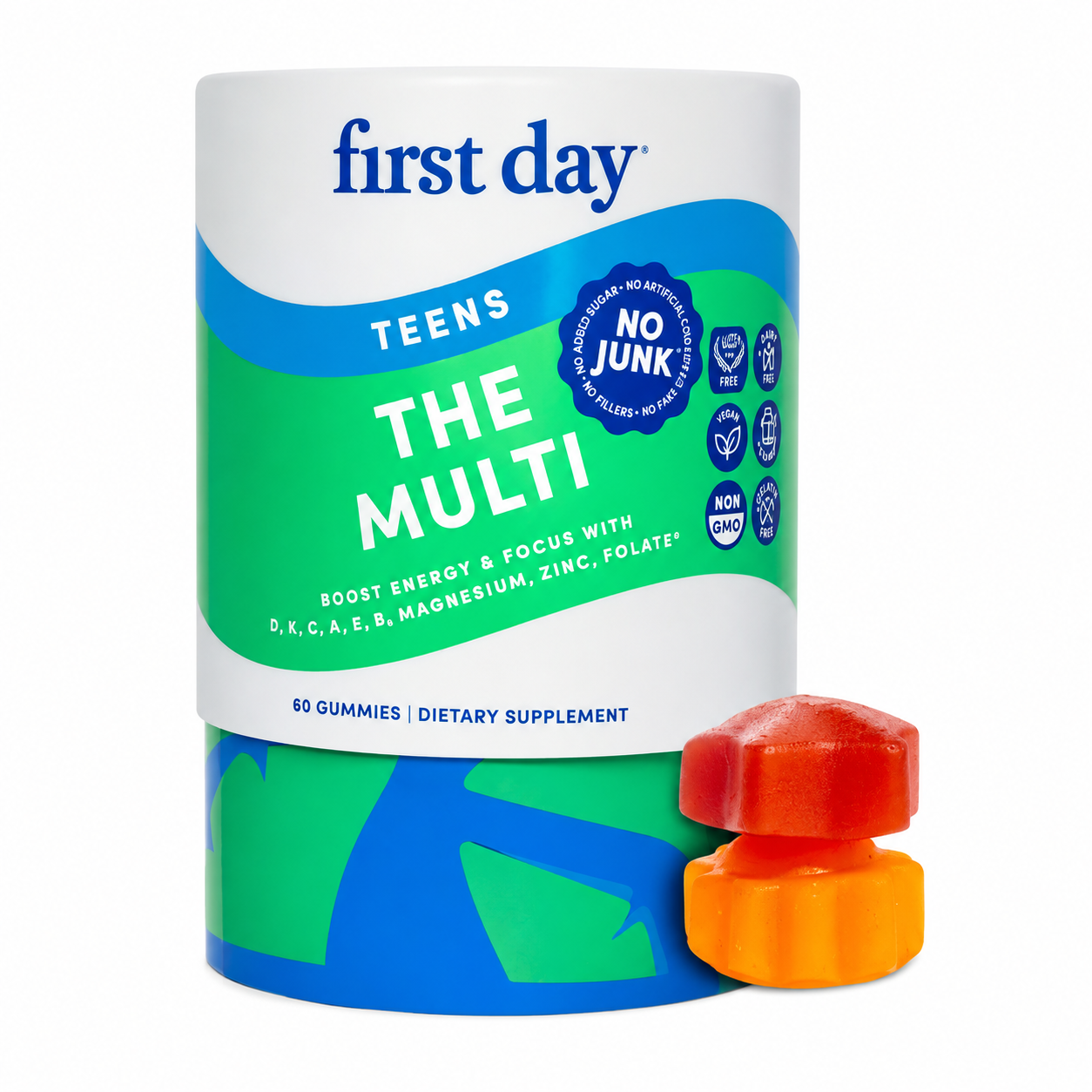 A white, green, and blue bottle of First Day Teens The Multi gummy vitamins with two gummies nearby.