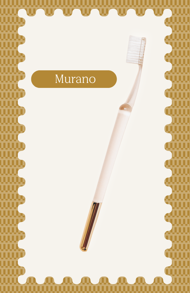 Toothbrush with white bristles, labeled 'Murano', on a decorative background.