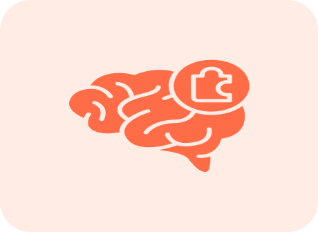 A stylized coral-colored brain with a puzzle piece icon over it on a light pink background.