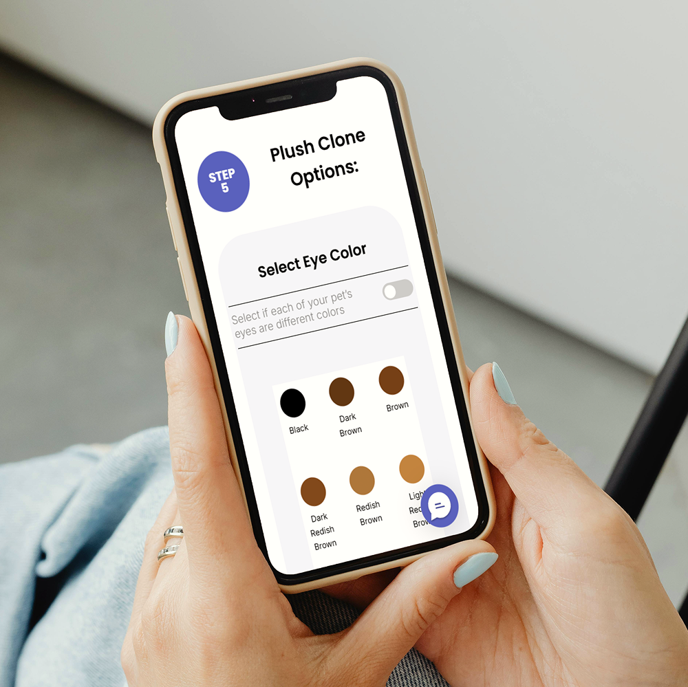 Person holding a phone displaying a pet eye color selection screen.