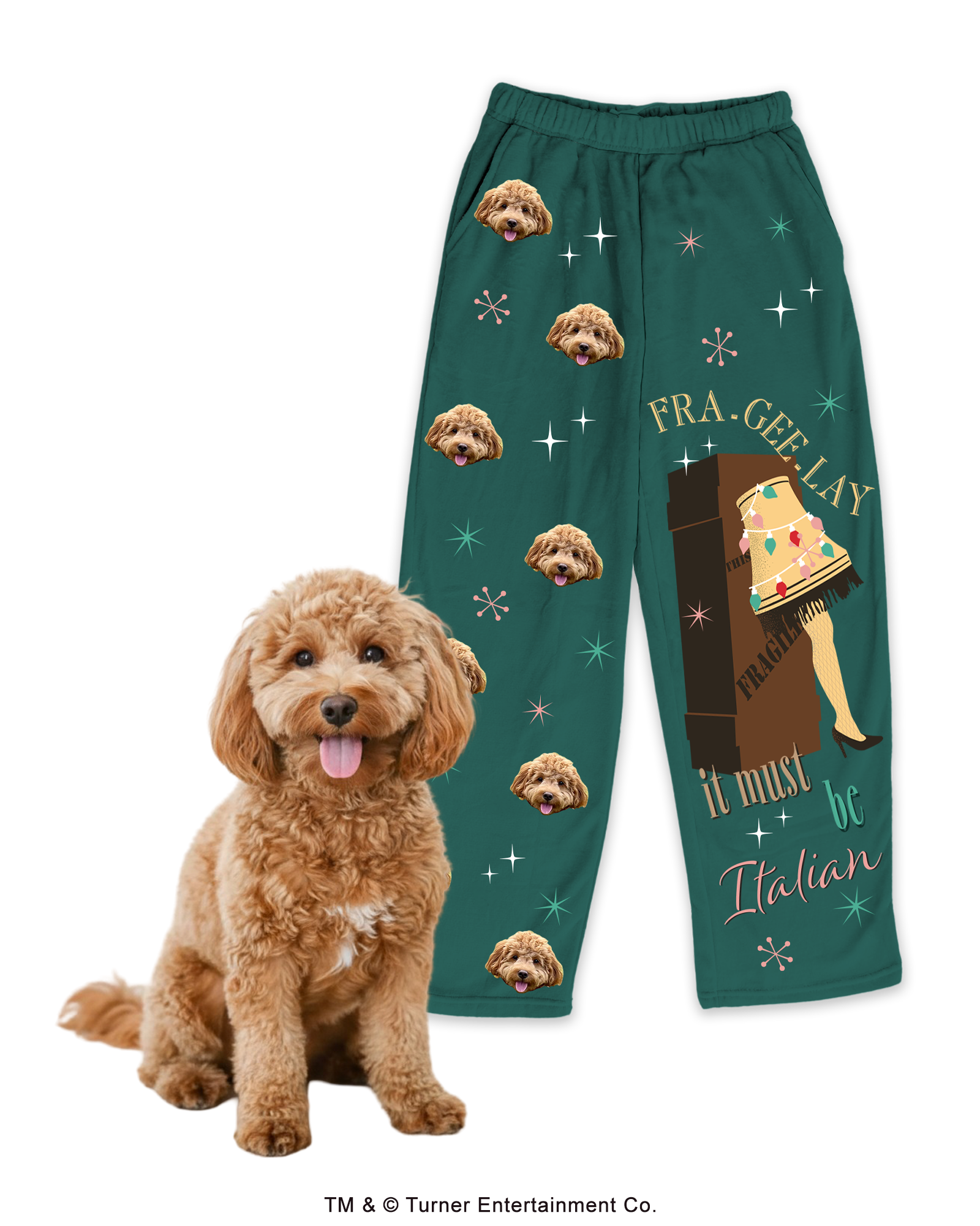 Green pajama pants with dog faces and a lamp design, near a fluffy dog.