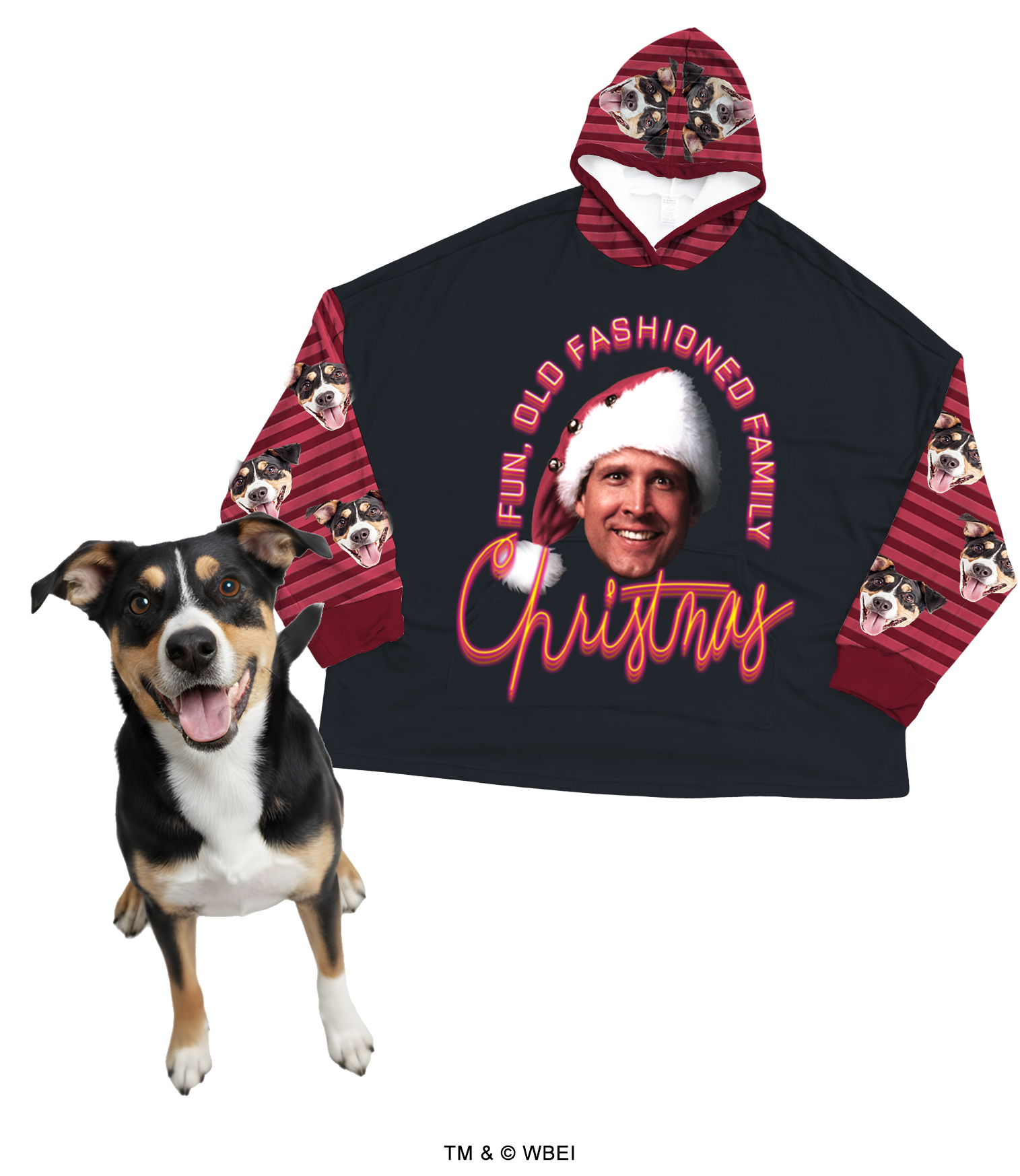 An oversized, black hooded blanket featuring a central graphic of a man wearing a Santa hat and the neon-style text 'FUN, OLD FASHIONED FAMILY Christmas.' The sleeves and hood are patterned with red and black stripes, customized with a repeating design of a black, white, and tan dog's face. A real dog with matching markings stands happily in the foreground.