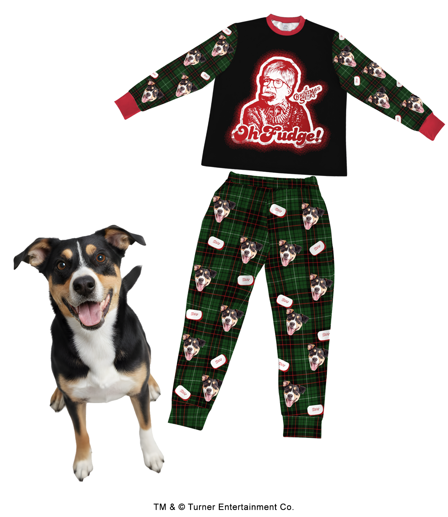 A custom pajama set featuring a black, white, and tan dog. The top is black with red trim and a central red and white graphic of Ralphie with soap in his mouth and the quote 'Oh Fudge!' The pants are a green, red, and black plaid pattern, customized with a repeating design of the dog's face and small white 'SOAP' blocks. A real dog with matching markings stands happily in the foreground.
