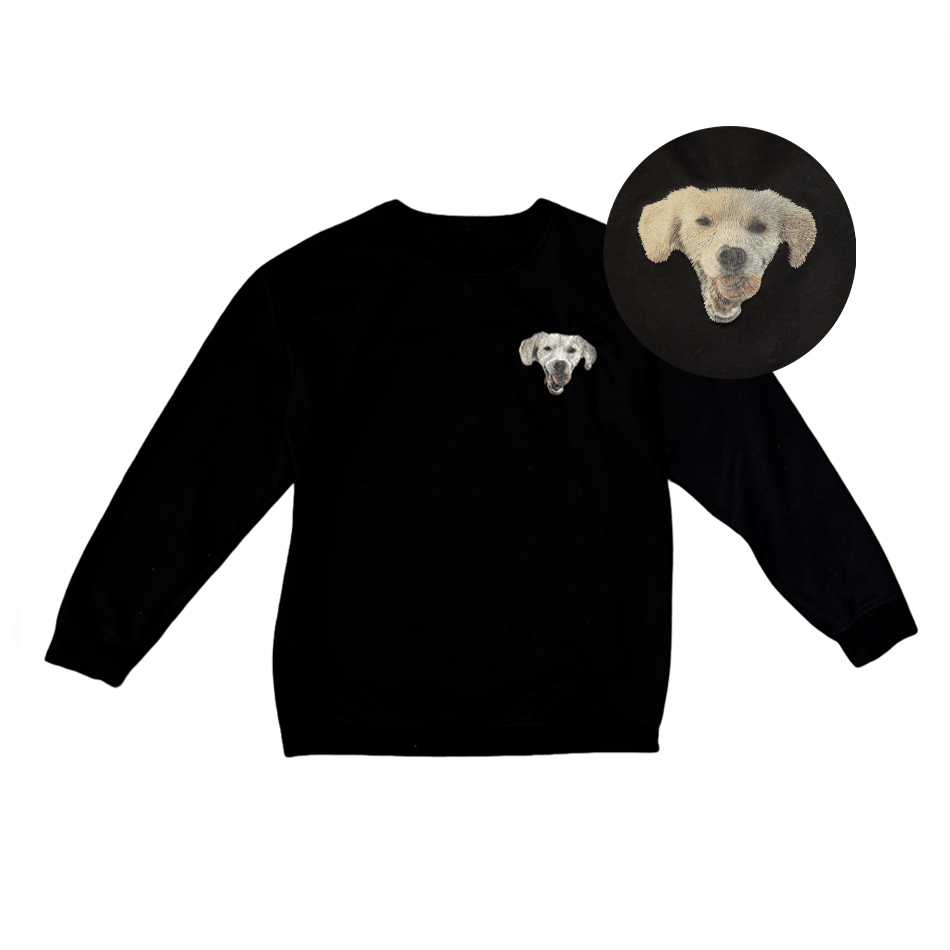 Black sweatshirt with embroidered dog face on the chest.