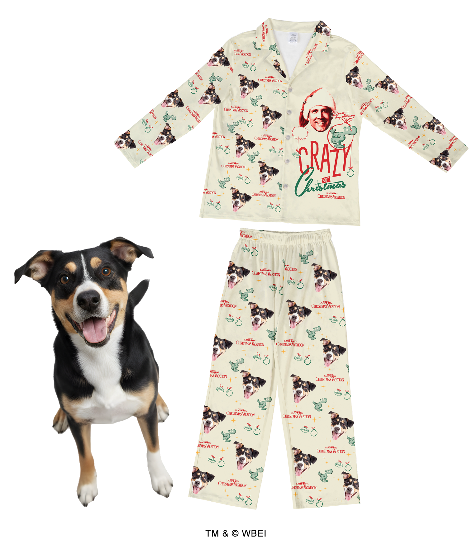A light beige pajama set (long-sleeve collared top and pants) featuring the theme of National Lampoon's Christmas Vacation. The top has a graphic of Clark Griswold wearing a Santa hat and the quote 'Crazy Christmas.' The entire set is patterned with a repeating design of a black, white, and tan dog's face, Christmas Vacation logos, and small green ornaments. A real dog with matching markings stands happily in the foreground.