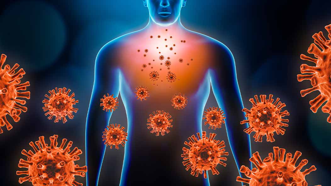 Illustration of a human silhouette surrounded by virus particles.