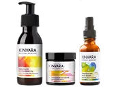 Three skincare product bottles with colorful labels.