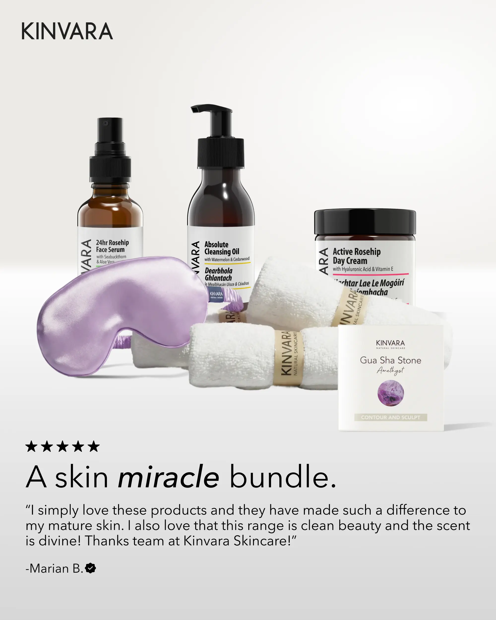 A collection of Kinvara skincare products, including serums, creams, an eye mask, and a gua sha stone.