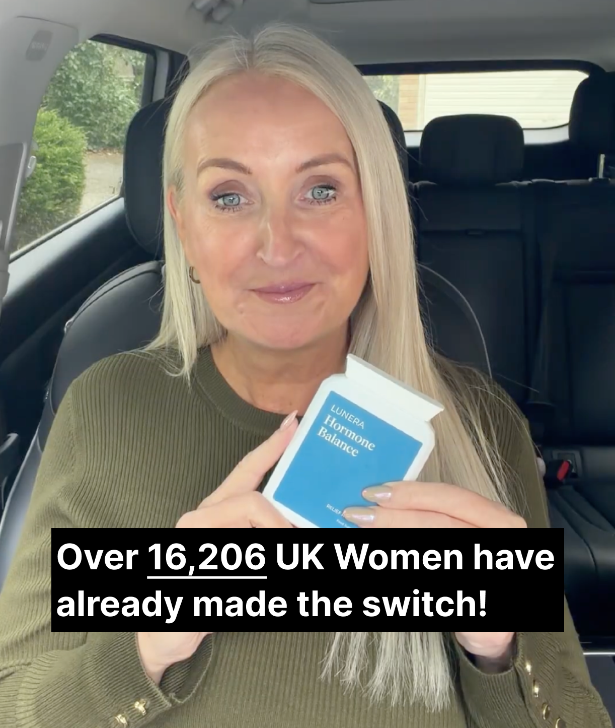 A woman in a car holds a white and blue packet labeled 'LUNERA Hormone Balance'.