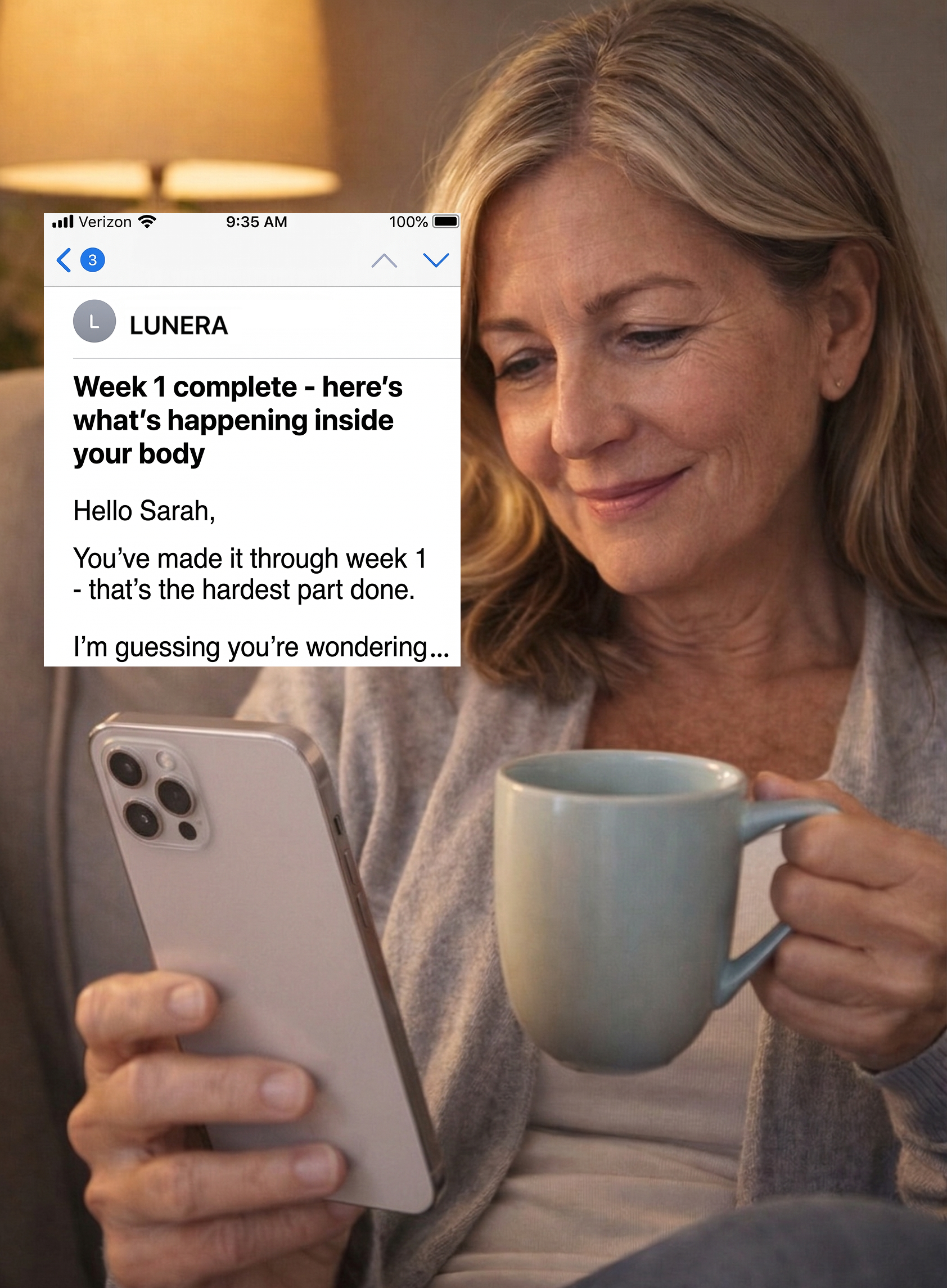 A woman smiles while reading an email from Lunera on her phone and holding a mug.