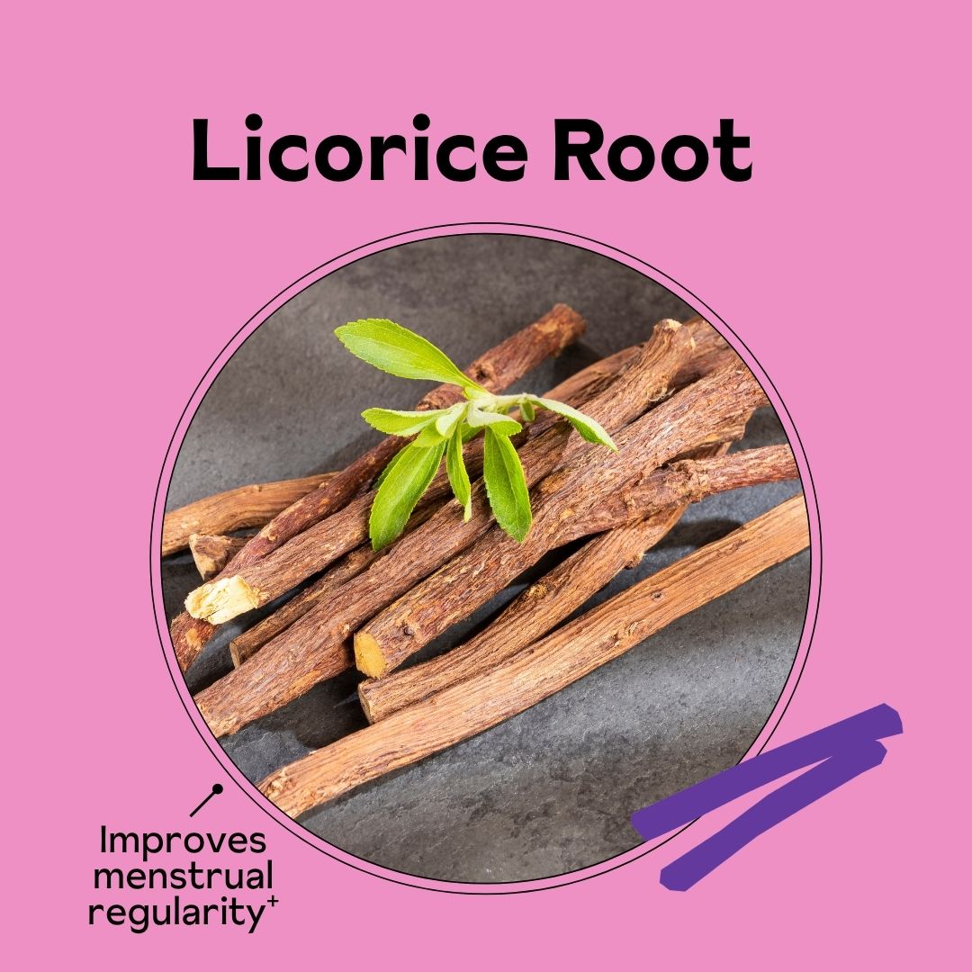 Licorice root sticks with green leaves on a pink background.