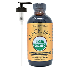 Bottle of black seed oil with a dispensing pump.