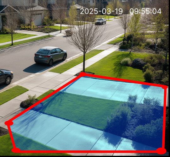 Residential driveway with highlighted security zone overlay, captured by outdoor surveillance camera on a suburban street, dated March 19, 2025, at 09:55 AM