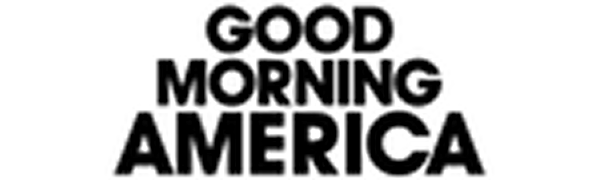 Black and white illustration of a cat with a long tail.