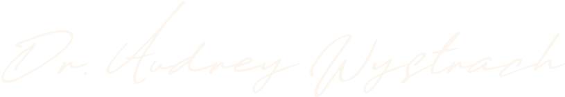 'Stylized cursive signature of Dr. Audrey Wystrach.'