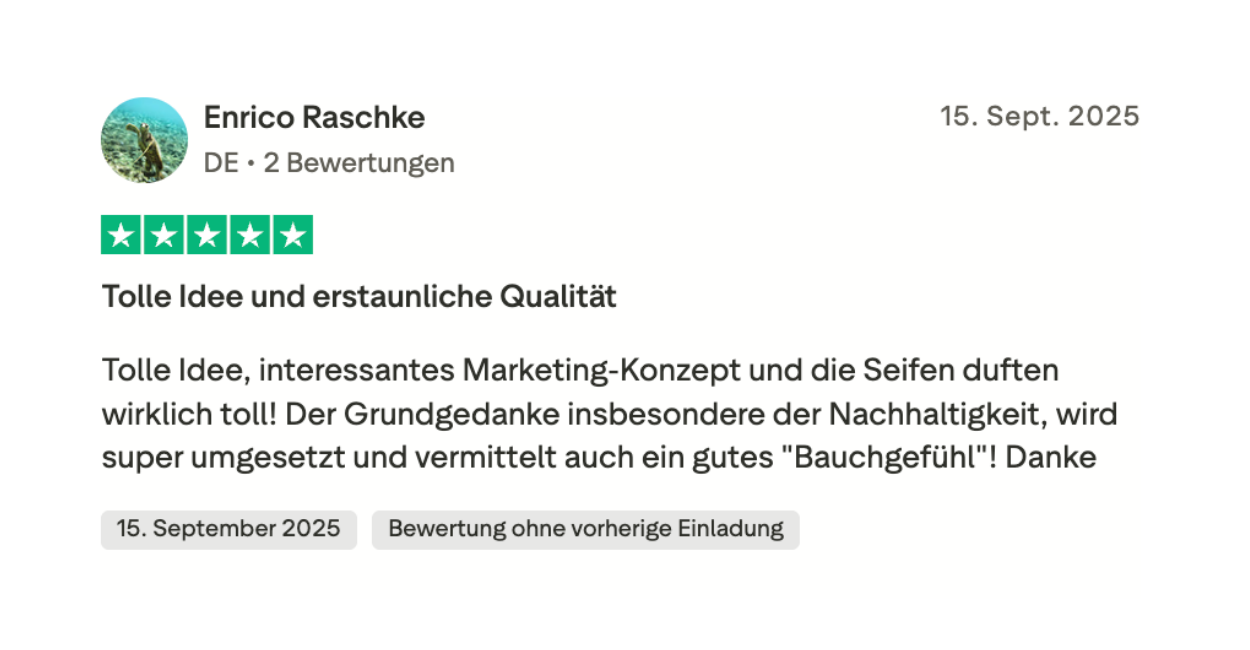 Review with five stars, user photo, name, date, and text in German.