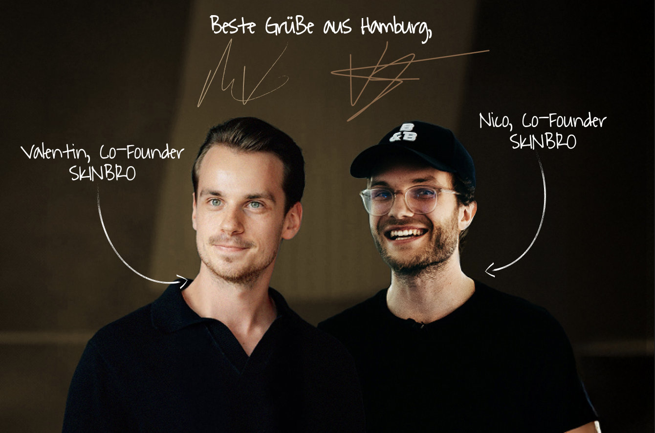Two men smiling with text labels and signatures above.