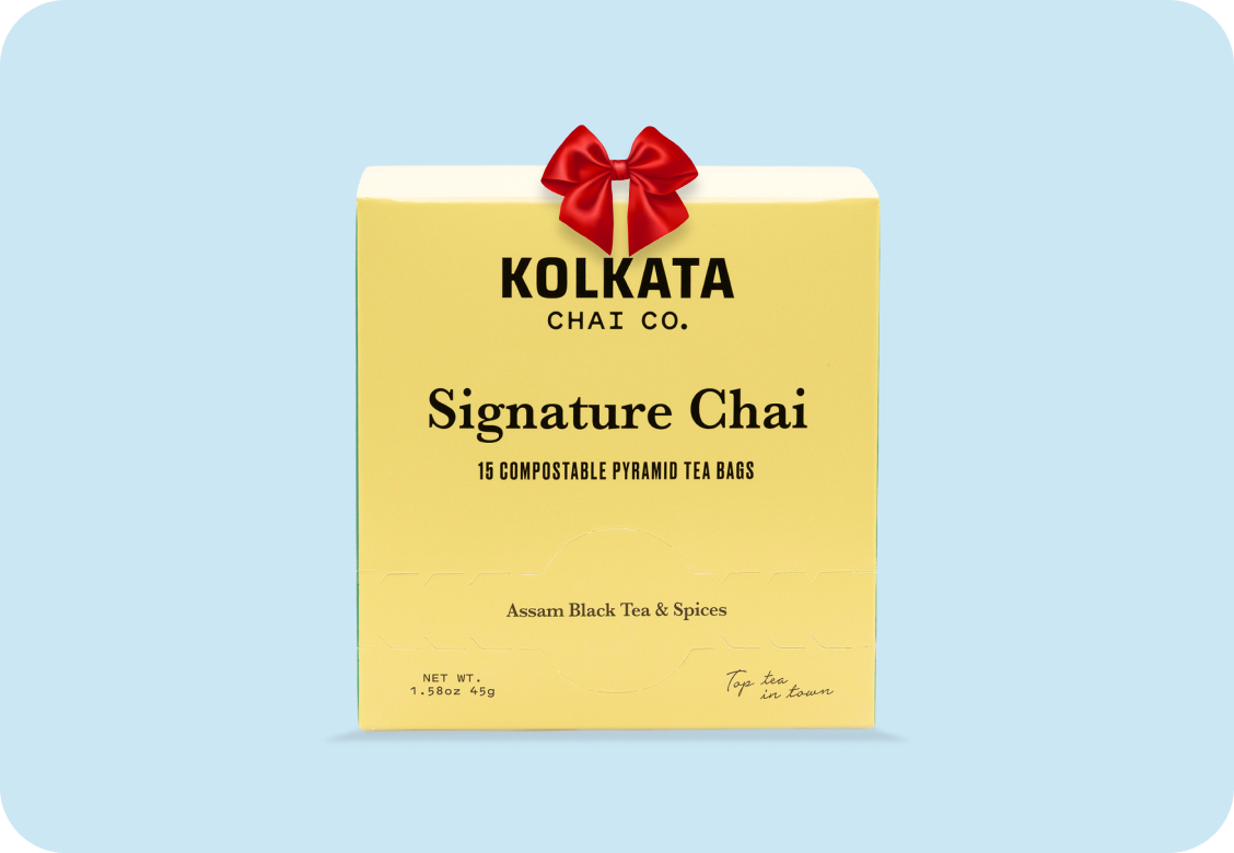 Box of Kolkata Chai Co. Signature Chai with red bow.