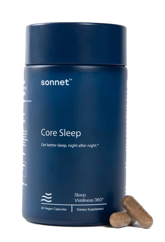 A blue bottle of Sonnet Core Sleep dietary supplement with three capsules resting next to it.