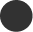 A pixelated dark gray circle on a black background.