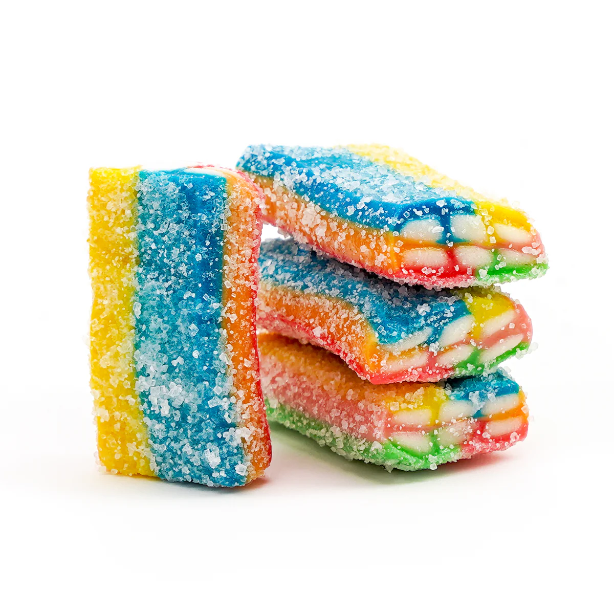 Stack of sugar-coated, colorful layered candies on white background.