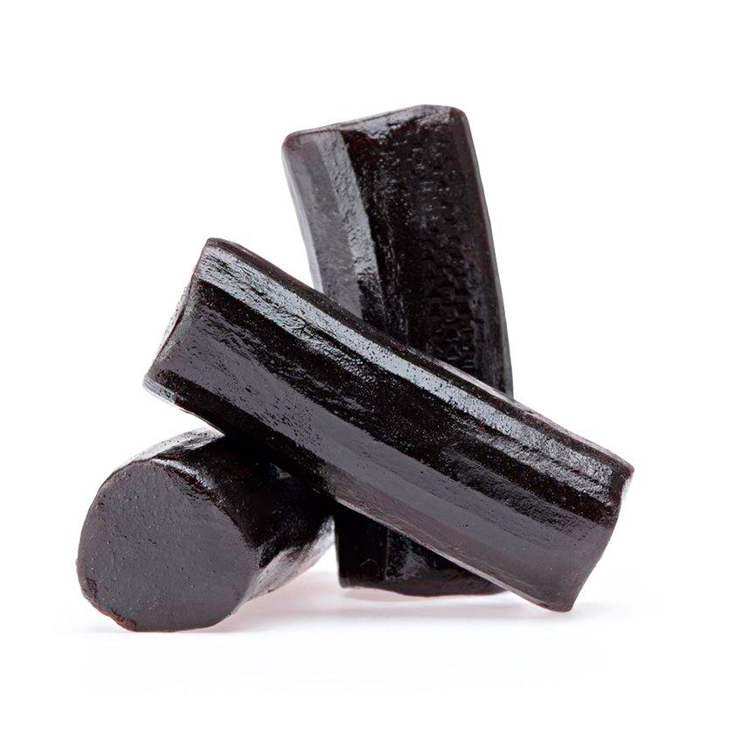 Three pieces of black licorice stacked on a white background.