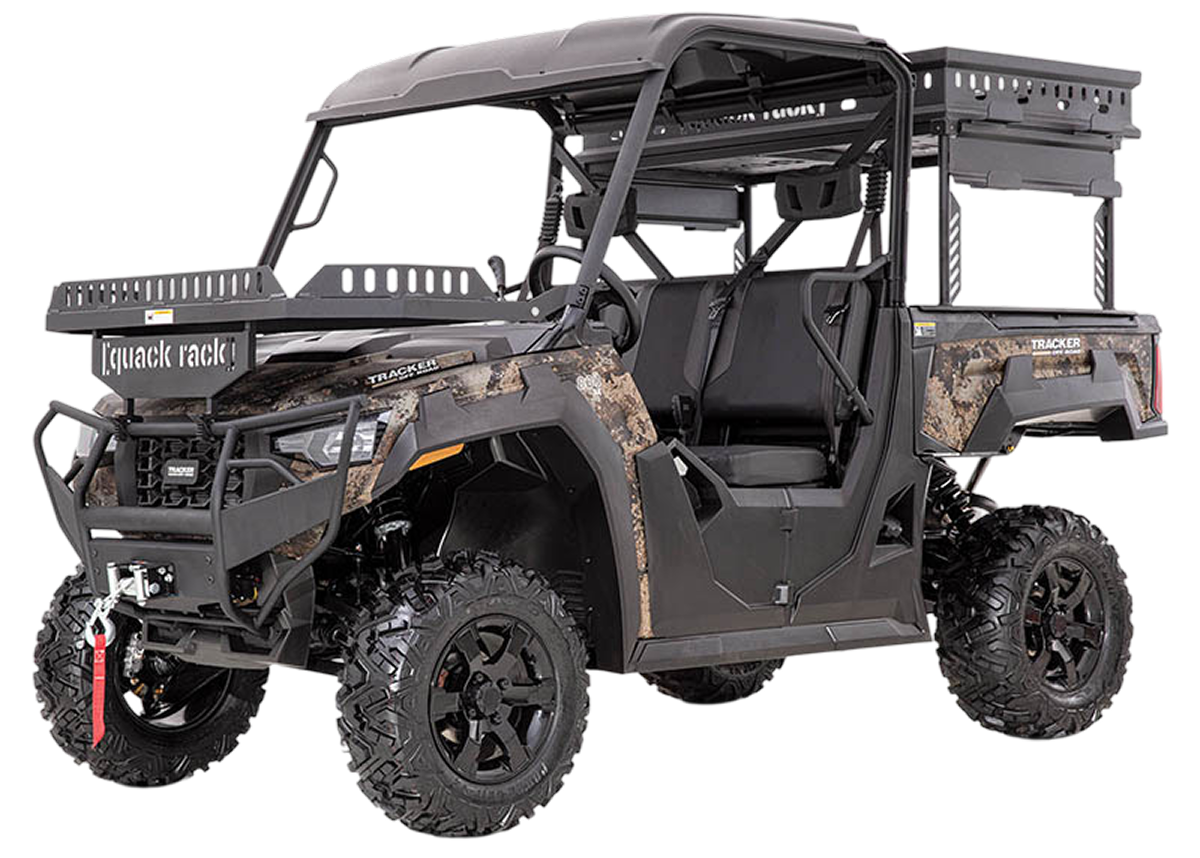 A black and camouflage Tracker UTV with front and rear cargo racks on a white background.
