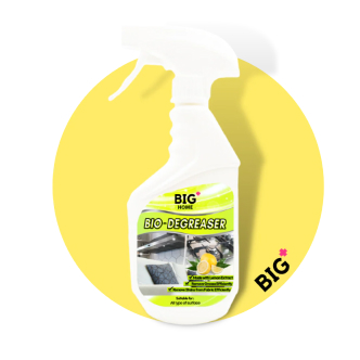 A white spray bottle of BIG HOME BIO-DEGREASER cleaner set against a bright yellow circular background.