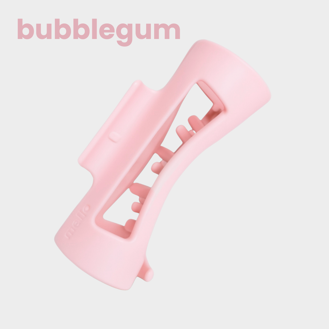 A pink plastic device with a handle and prongs, labeled 'bubblegum'.