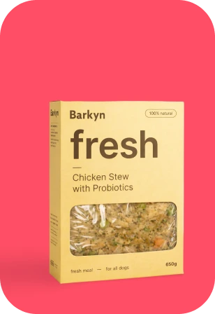A yellow box of Barkyn fresh Chicken Stew with Probiotics dog food on a pink background.