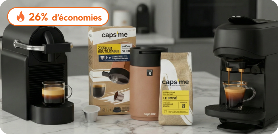 Two black espresso machines with Caps me reusable pods, coffee, and a travel mug on a counter.