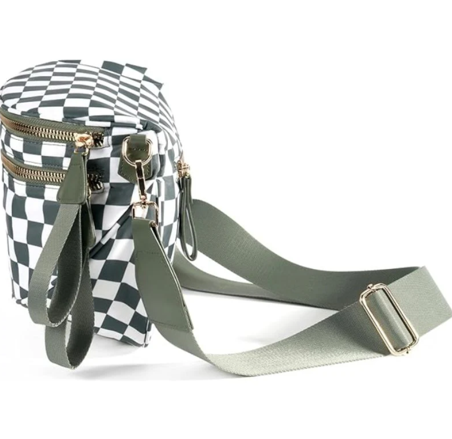 Checkered bag with green strap and gold zippers.