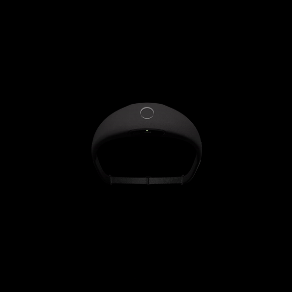 Black headband with a single button against dark background.