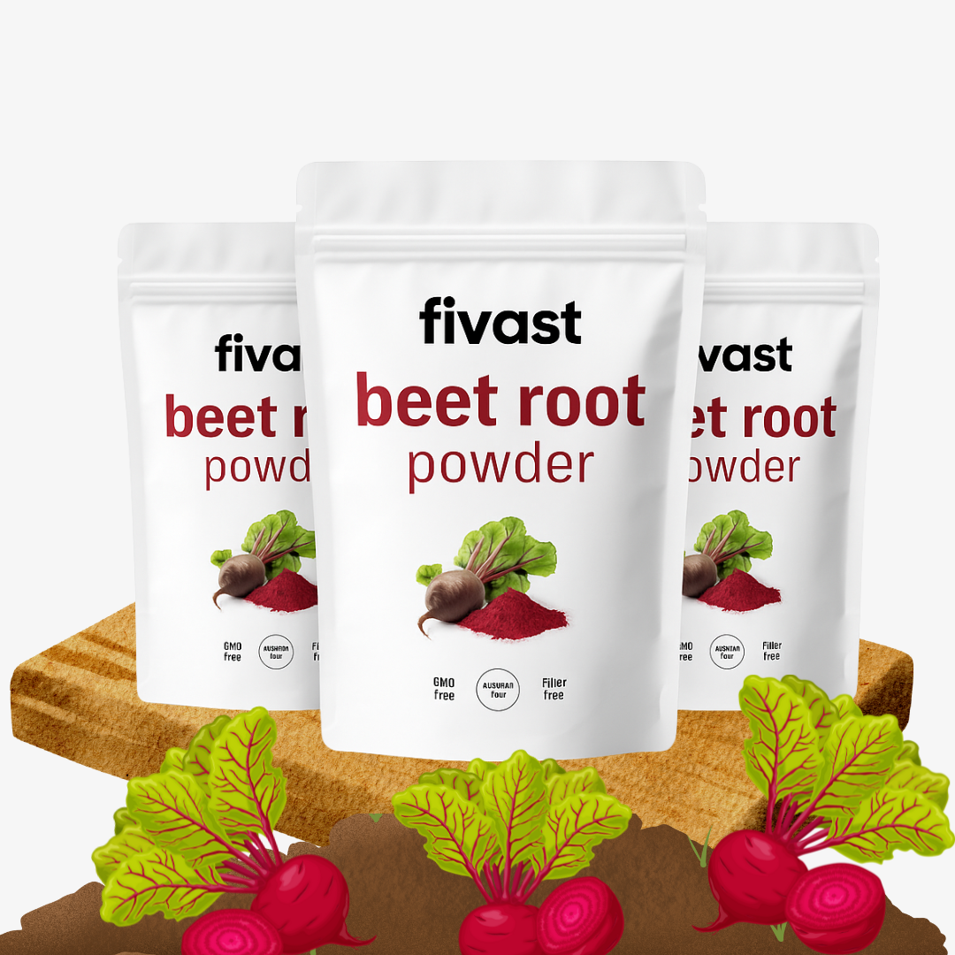Three white bags labeled 'beet root powder' with beet graphics on a wooden surface.