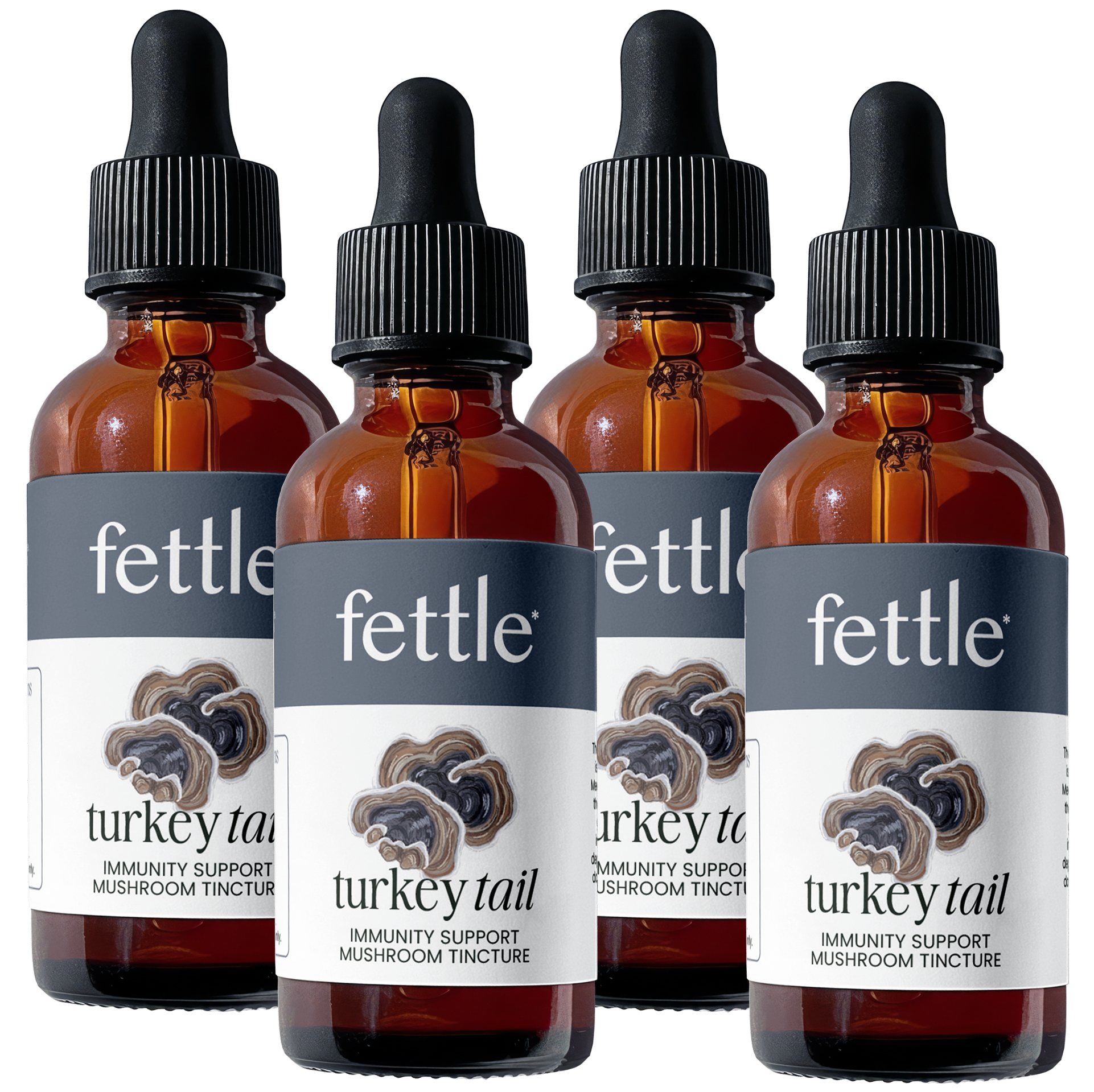 Four amber glass dropper bottles of Fettle Turkey Tail mushroom tincture.