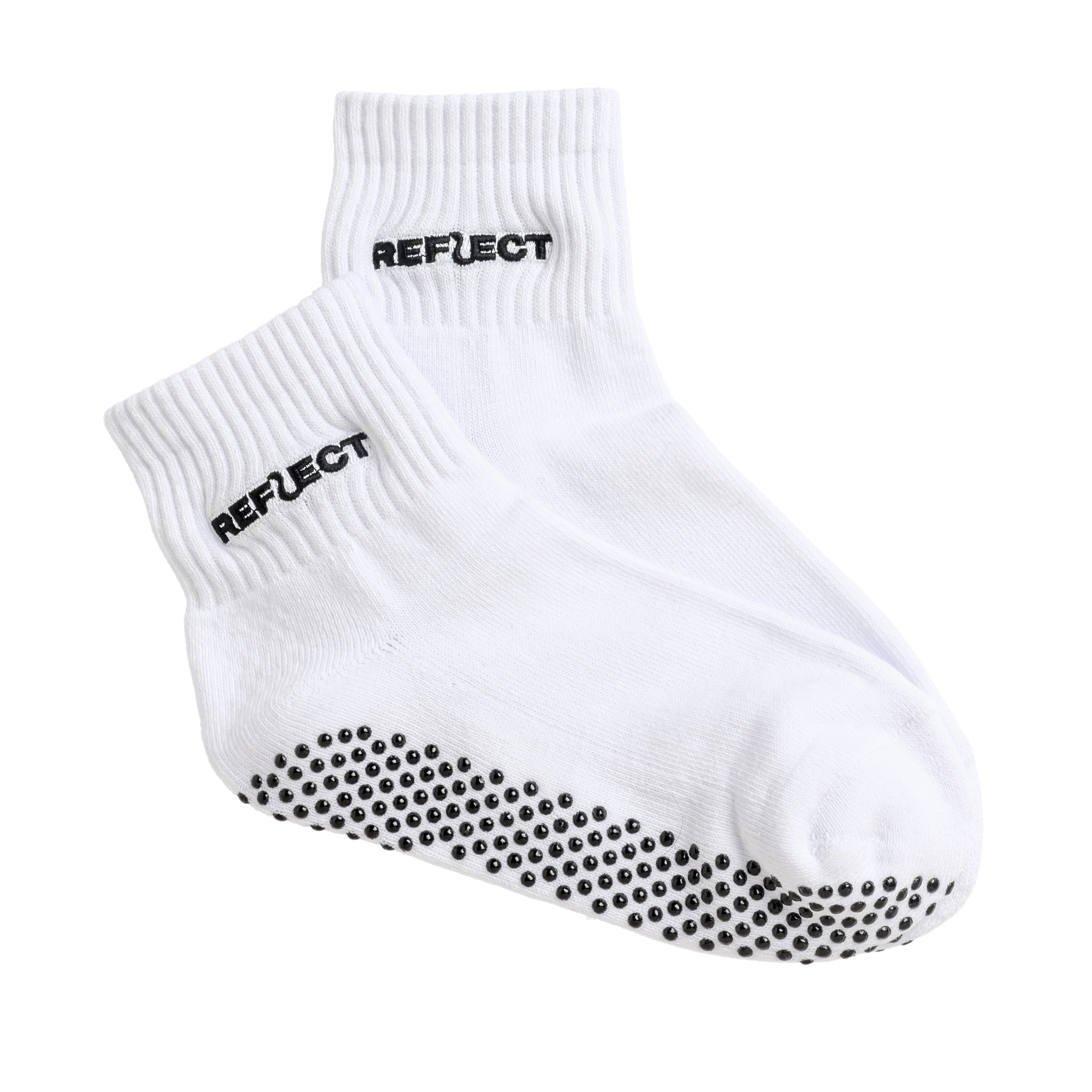 A pair of white ankle grip socks with black anti-slip soles and Reflect branding.