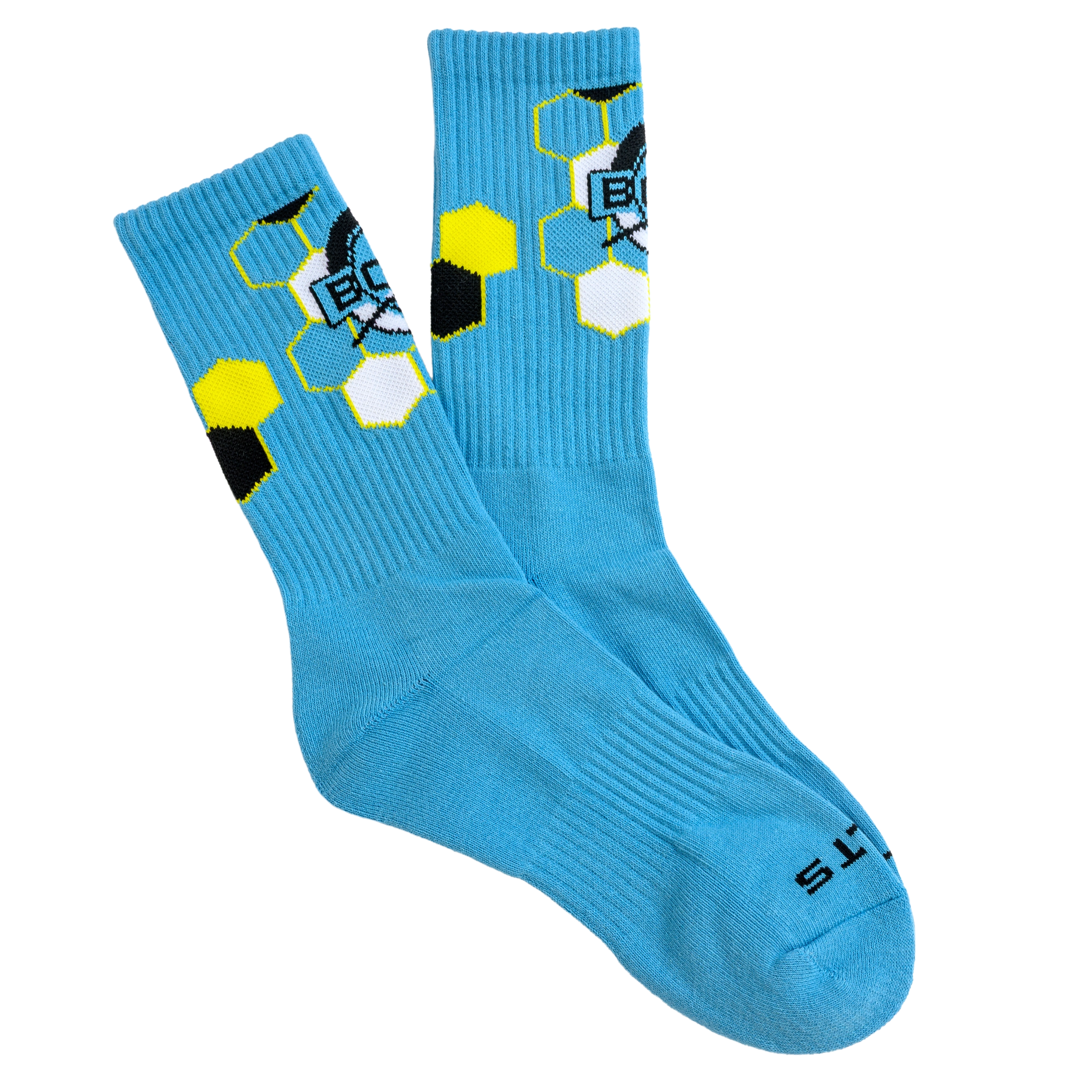 A pair of light blue ribbed crew socks with a yellow, black, and white honeycomb pattern.